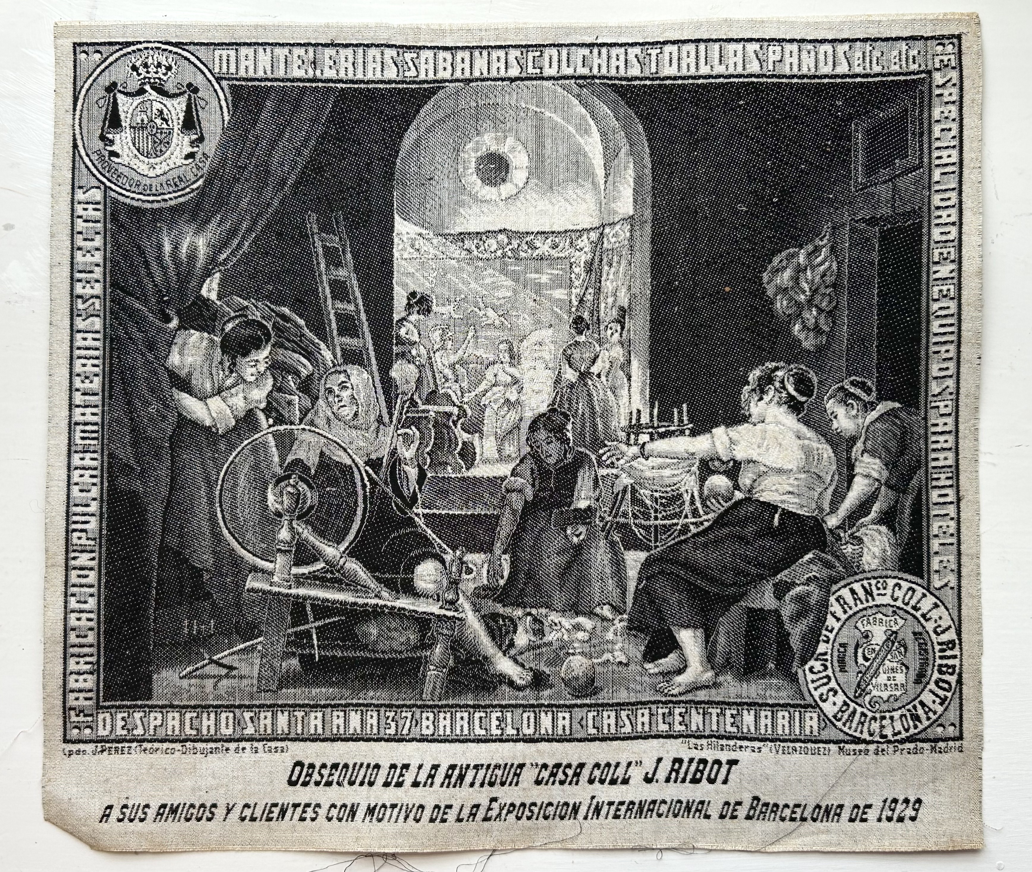 [Textiles – Advertising]. “Obsequio de la Antigua ‘Casa Coll’ J. Ribot a sus Amigos y Clientes…” (Gift from the Old “Casa Coll” J. Ribot to Friends and Clients). Single cloth sheet (23.3 x 26 cm) with illustration and text in black on white ground (very slight dustsoiling to lower edge). Barcelona: [J. Ribot], 1929.